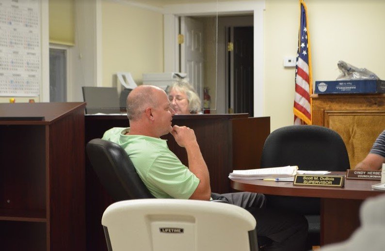 Town of Delaware supervisor Scott DuBois deliberates with the town board on October 11.